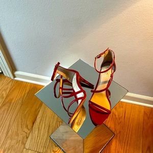 Patent leather red 3 inch strappy heels to spice up your holiday outfit!